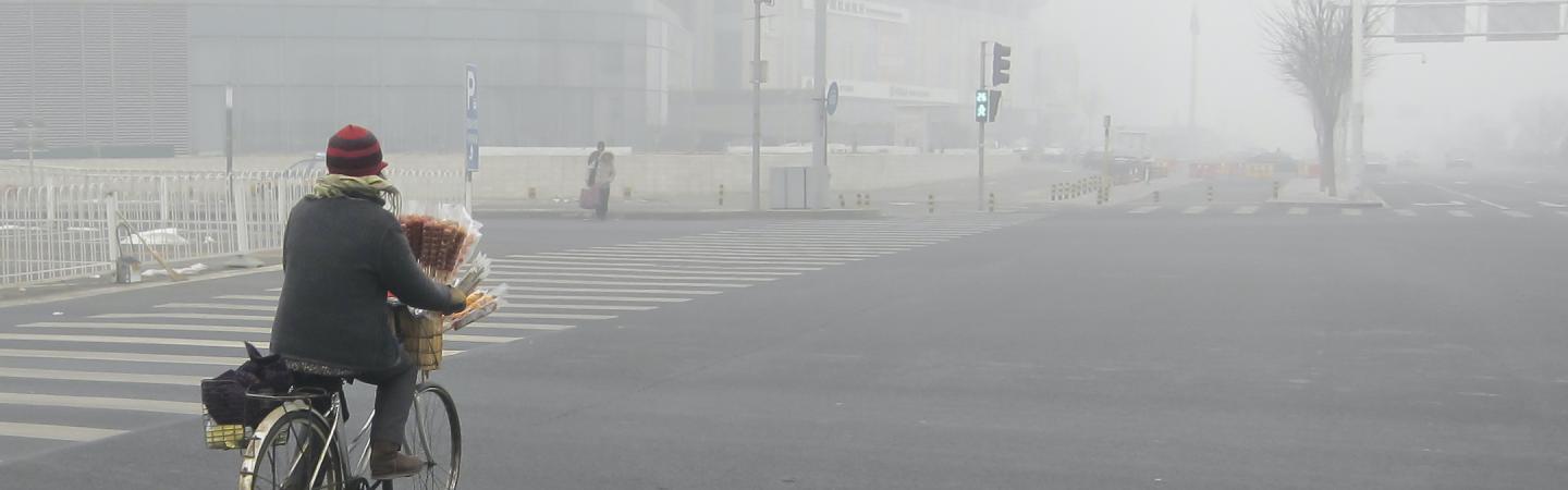 biking through smog in Beijing