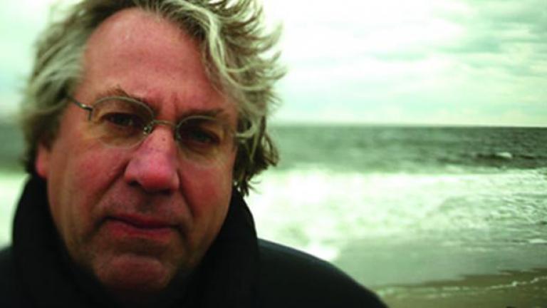 Kerry Emanuel in front of ocean