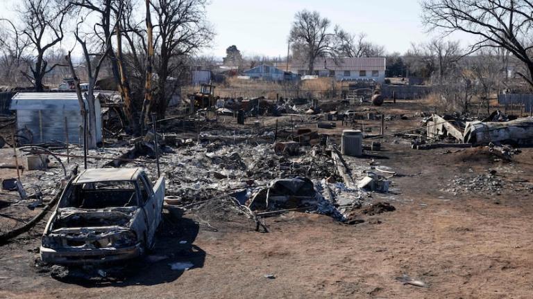 A truck and house destroyed by the Smokehouse Creek Fire are seen, Friday, March 1, 2024, in Stinnett, Texas. The wildfire became the largest in state history at over one million acres. Climatologists believe wildfires will become more common as global temperatures warm