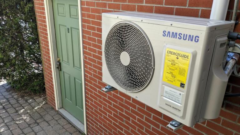 A heat pump is installed on a condo building in Portland's West End