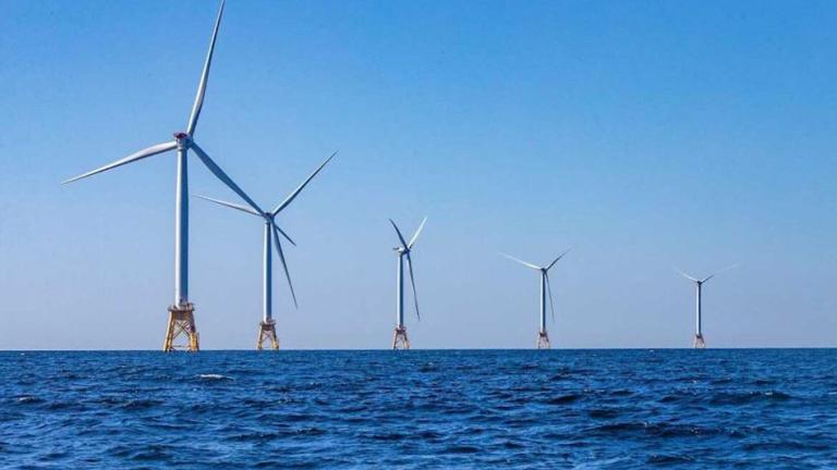 Photo: Deployment of offshore wind at utility scale is one of many strategies to reduce greenhouse gas emissions in alignment with net-zero emissions targets. (Source: Jesse Costa/WBUR)
