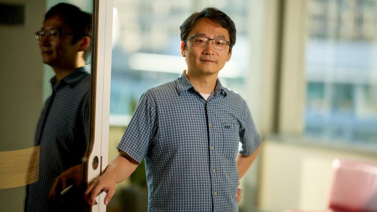 MIT Associate Professor Andy Sun works on new methods to integrate renewable energy into the electric grid.