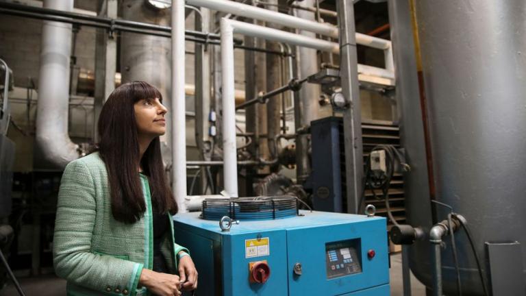 Renewlogy co-founder and CEO Priyanka Bakaya inside one of the company's commercial plants, which are capable of processing ten tons of plastic each day to create about 60 barrels of fuel.