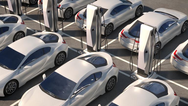 Cars parked at EV chargers
