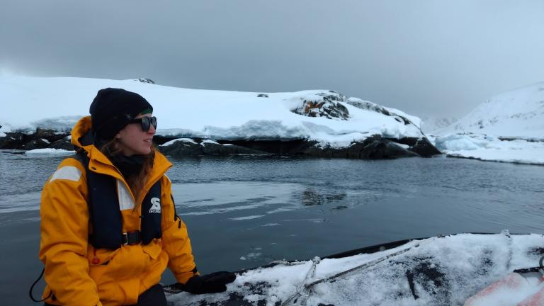 Woman overlooking icy waters