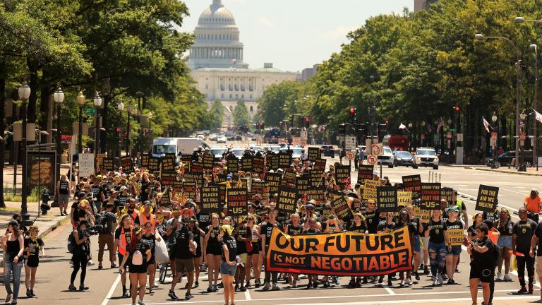 Climate protestors marching on capital hill