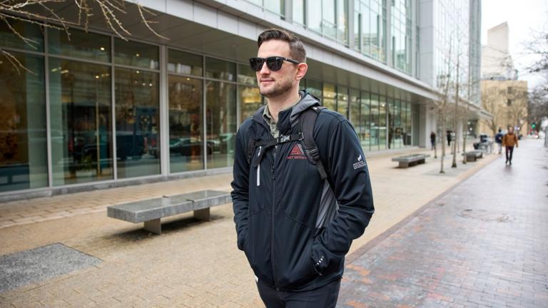 MIT Sloan MBA student David Brown, the co-founder of Helix Carbon, walks through Kendall Square in Cambridge, Massachusetts.