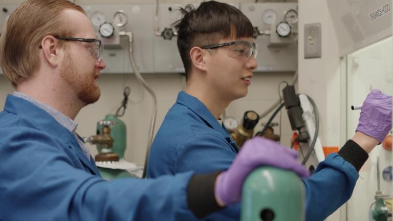 Glen Junor (left) and Fang-Yu Kuo work in the lab. 