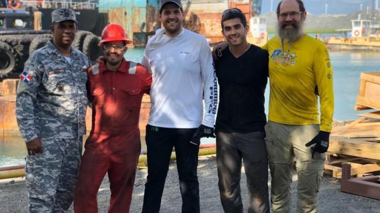 Left to right: Colonel Arsenio Soto Soto (DR Navy), MechE alumnus Folkers Rojas, MBA candidate Andrés Bisonó León, MechE alumnus Luke Gray, and Professor Alex Slocum at the SOS Carbon full-scale pilot at the Las Calderas Navy base at Bani in the Dominican Republic, in 2019.