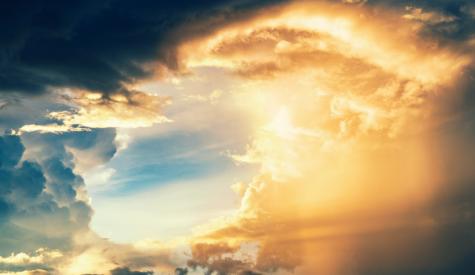 Image of clouds with sunlight coming through
