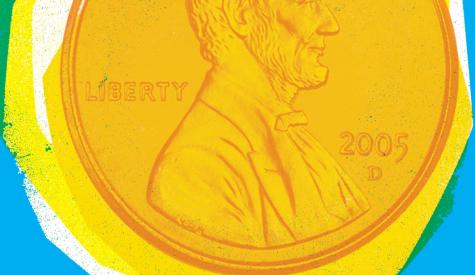 Image of exaggerated penny over house with solar panels