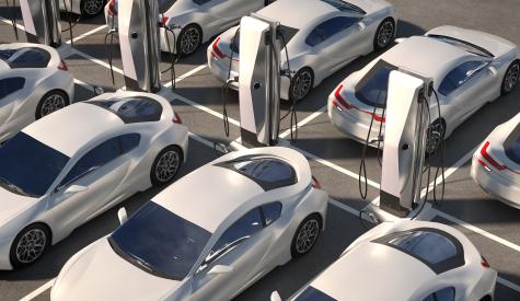 Cars parked at EV chargers