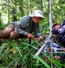 Researchers conduct carbon monitoring in a peat swamp forest in Central Kalimantan, Indonesia in 2017.