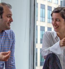 Ipek Bensu Manav (right) chats with Hessam AzariJafari, her colleague at the MIT Concrete Sustainability Hub. During her time at CSHub, Manav has placed engineering in its social and political contexts and built new connections in the process.