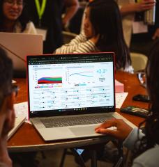 Undergraduate students explore the En-ROADS climate simulator.
