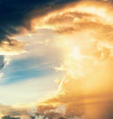 Image of clouds with sunlight coming through