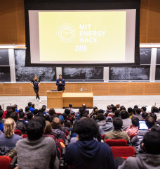 Students gather in the Stata Center to hear the 2019 MIT EnergyHack challenges. Participants had 36 hours to come up with a solution to the challenge they were assigned with their team members before presenting to company representatives, fellow hackers, and judges.