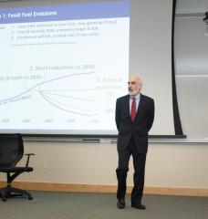 MIT Sloan Professor John Sterman making a presentation related to the climate policy simulators.
