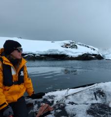 Woman overlooking icy waters