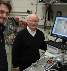 MIT Professor Harry Tuller (right), Visiting Associate Professor Jennifer Rupp, graduate student Thomas Defferriere (left), and colleagues have shown how light can boost the performance of lithium batteries, fuel cells, and other devices based on the movement of ions.