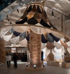VAMO (Vegetal, Animal, Mineral, Other), is an ultra-lightweight, biodegradable, and transportable canopy designed to circle around a brick column in the Corderie of the Venice Arsenale — a historic space originally used to manufacture ropes for the city’s naval fleet.