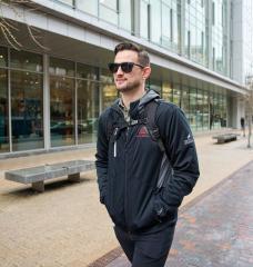 MIT Sloan MBA student David Brown, the co-founder of Helix Carbon, walks through Kendall Square in Cambridge, Massachusetts.