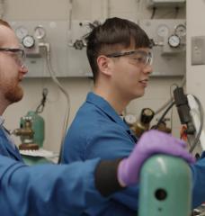 Glen Junor (left) and Fang-Yu Kuo work in the lab. 
