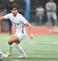  Dilin Meloni at midfield against Clark University; the Engineers won the game 2-0.