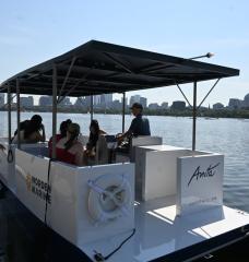 A group of visitors sets off from the dock for a cruise around the Charles River. The Anita weighs about 2,800 pounds and can accommodate six passengers at a time.