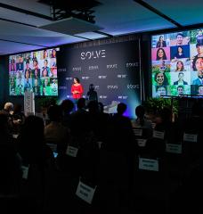 Hala Hanna, executive director of MIT Solve, addresses Solve Challenge Finals 2024 attendees.
