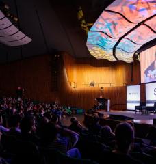 Globally recognized artist Beatie Wolfe commences Solve at MIT in Kresge Auditorium.
