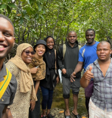 Researchers from the State University of Zanzibar and MIT students Mel Isidor (third from left) and Rajan Hoyle (far left) enjoy a field visit to Uzi Island, Zanzibar, to learn about seaweed farming.